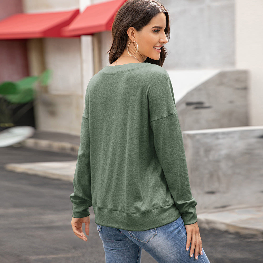 Blusa de manga larga con botones y diseño lujoso