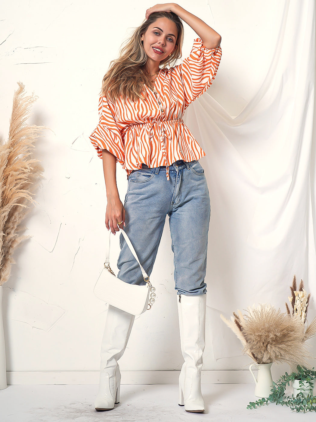 Blusa de manga larga con botones y estampado de cebra 