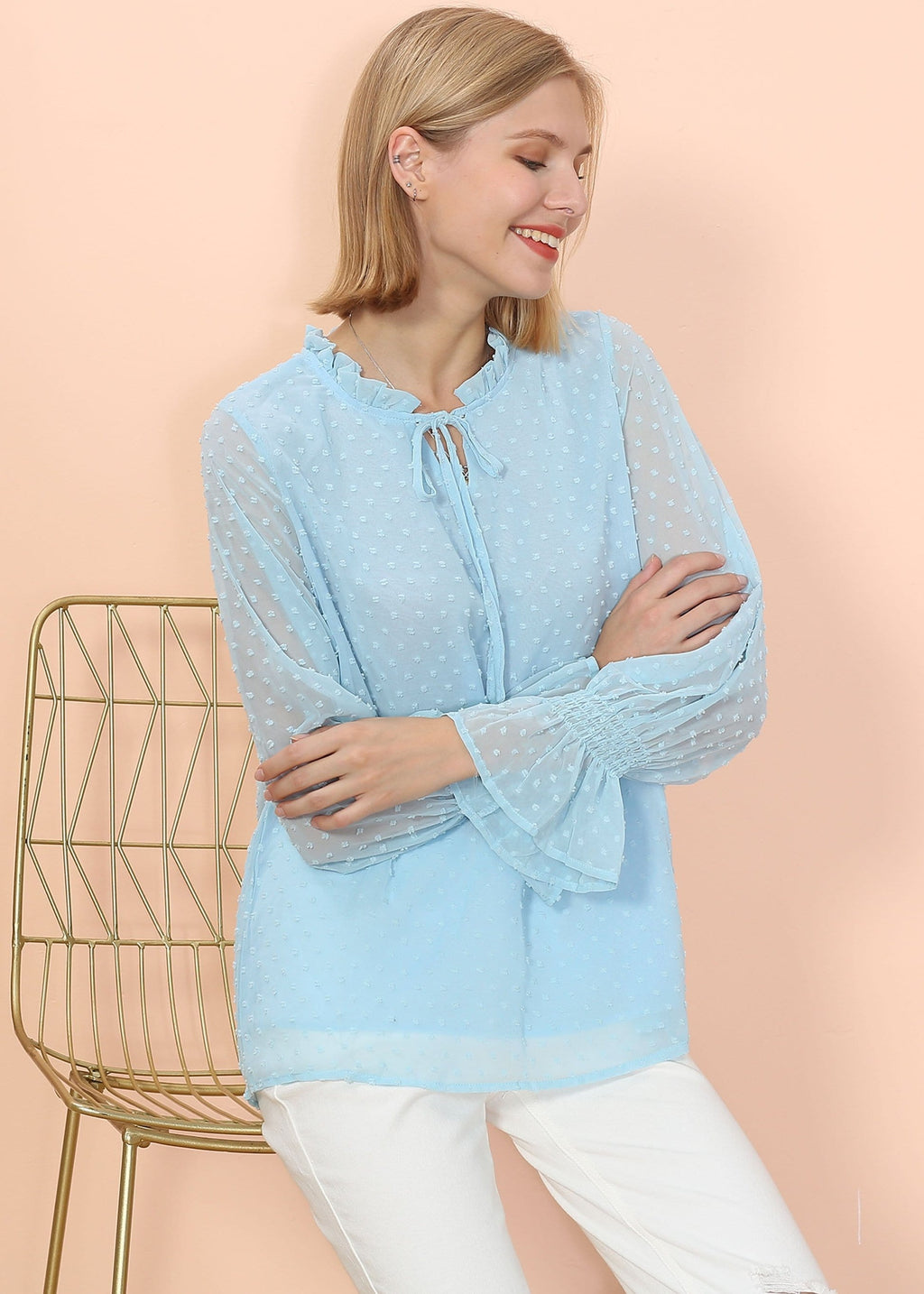 Blusa tipo suéter de manga larga con lunares y clip