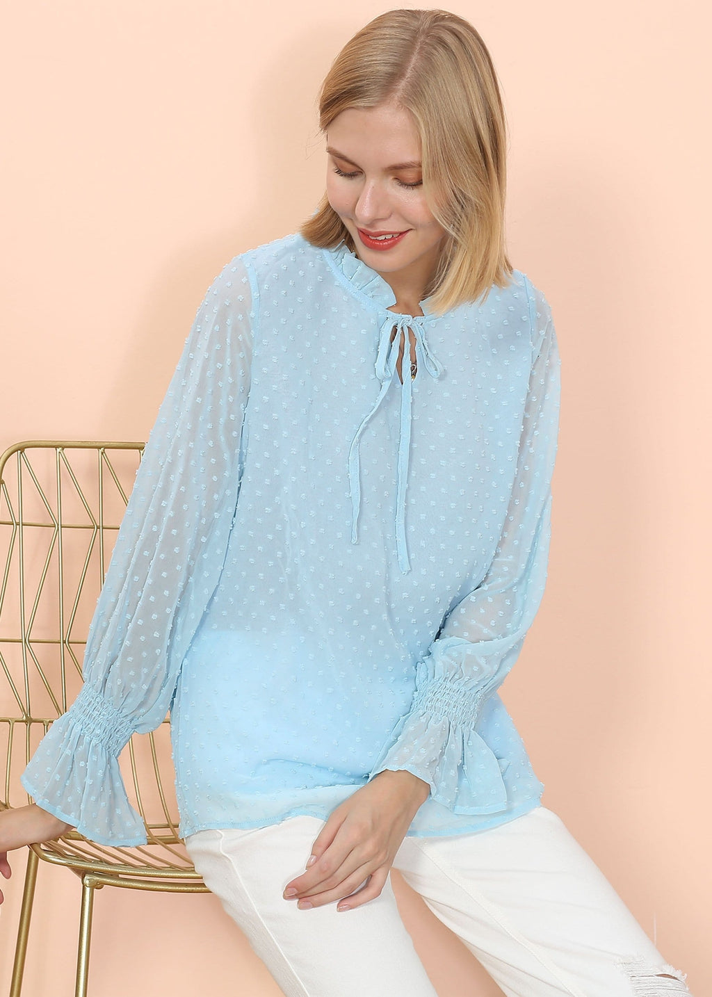 Blusa tipo suéter de manga larga con lunares y clip