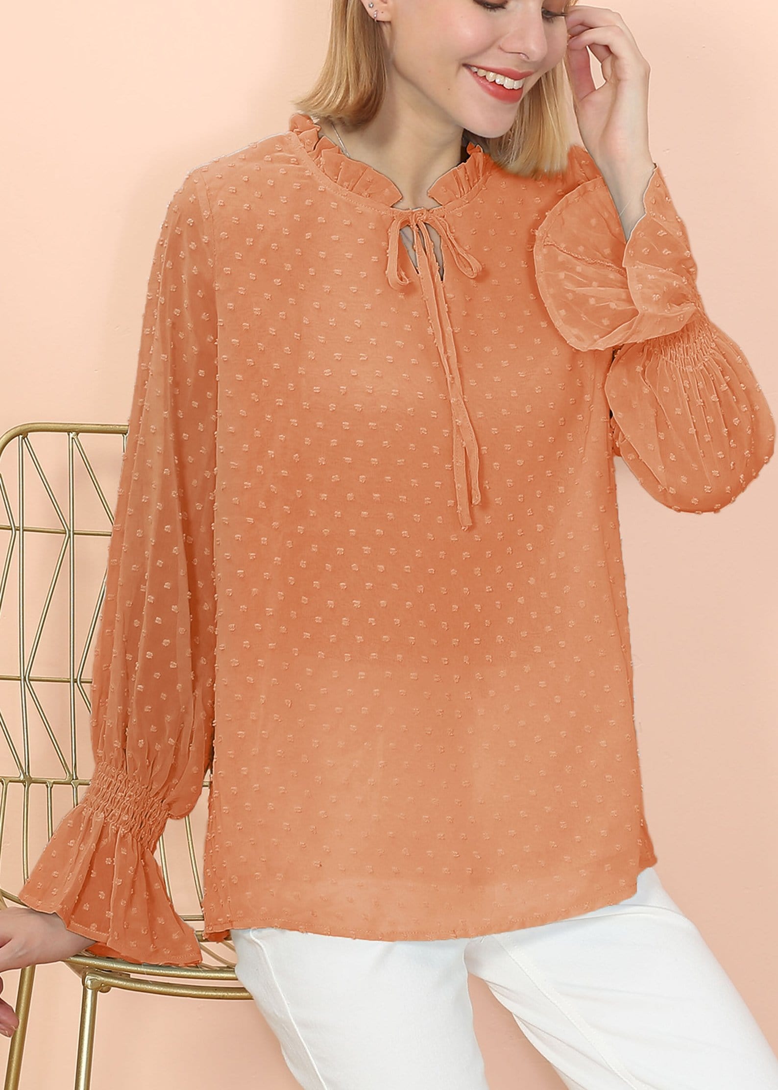 Blusa tipo suéter de manga larga con lunares y clip