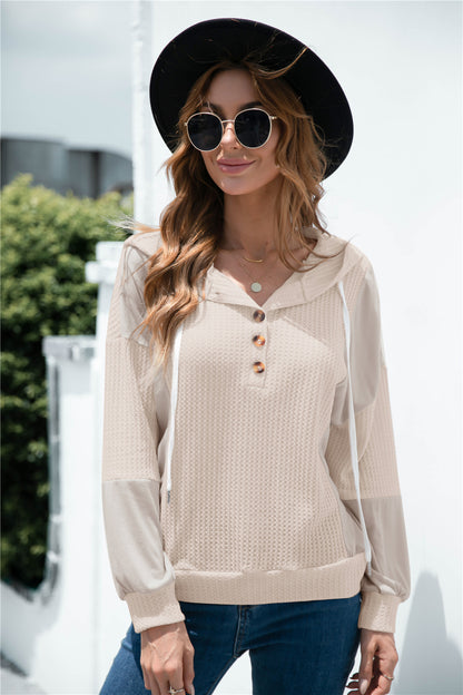 Sudadera con capucha y botones de punto en tonos mixtos