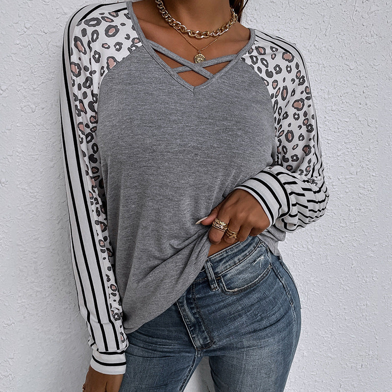 Blusa de manga larga con estampado de leopardo a rayas