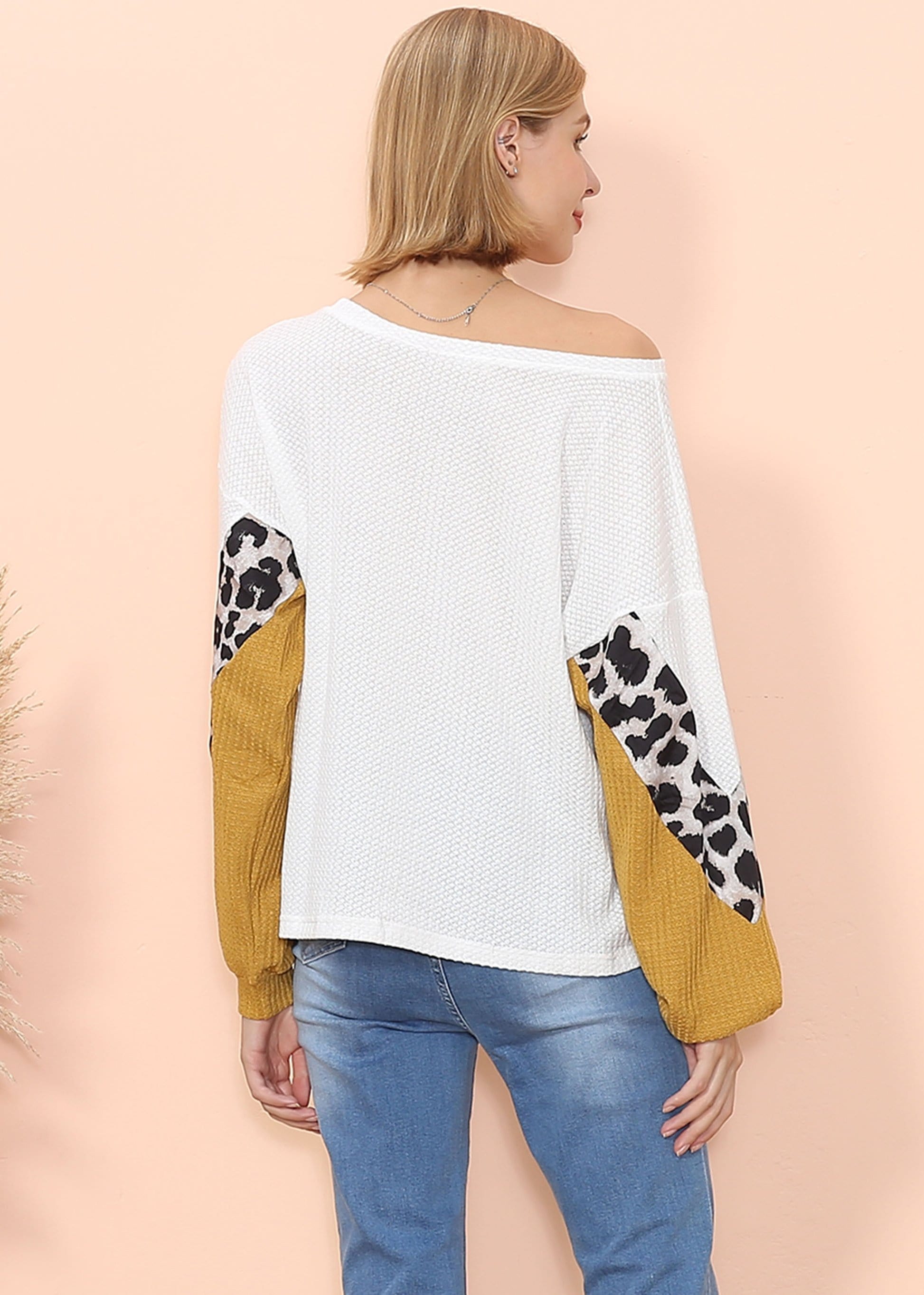 Jersey de manga larga con estampado de guepardo y tejido gofre