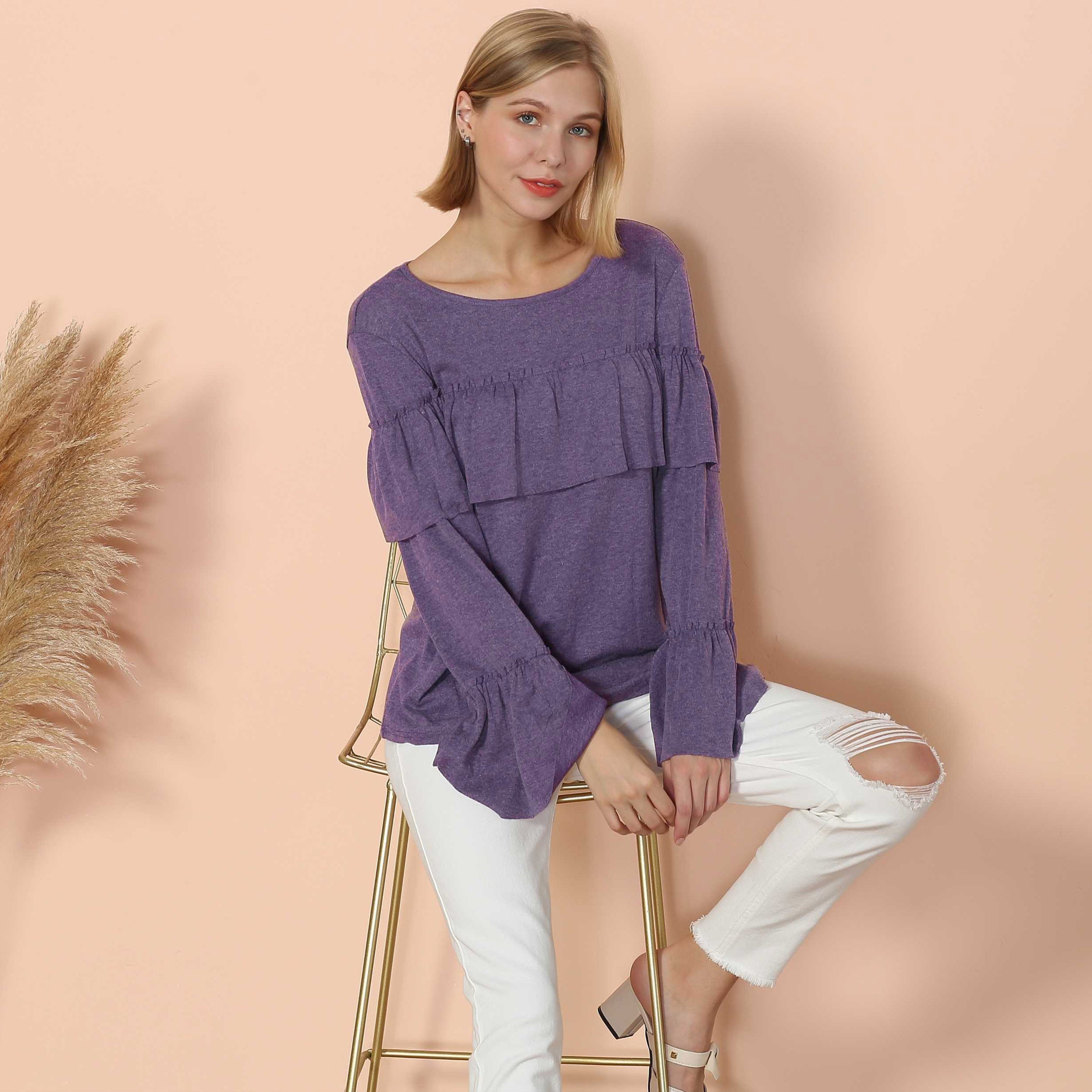 Blusa de manga larga con volantes en el pecho