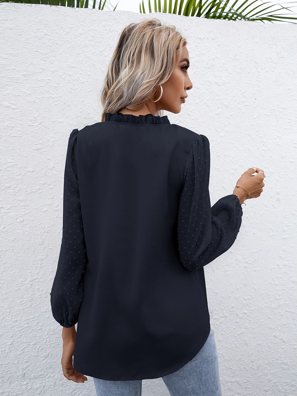 Blusa de manga larga con lunares y campana Clip