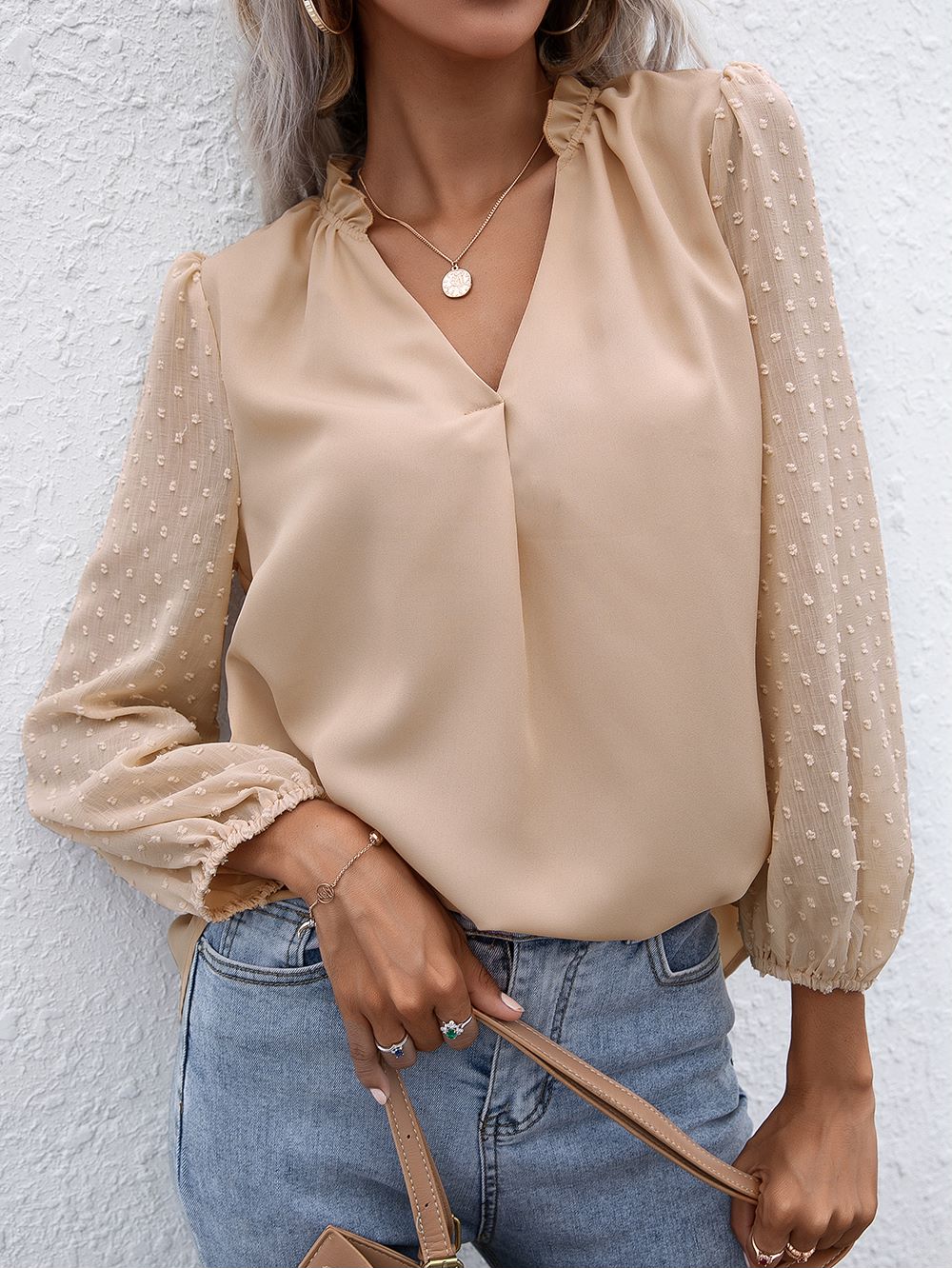Blusa de manga larga con lunares y campana Clip