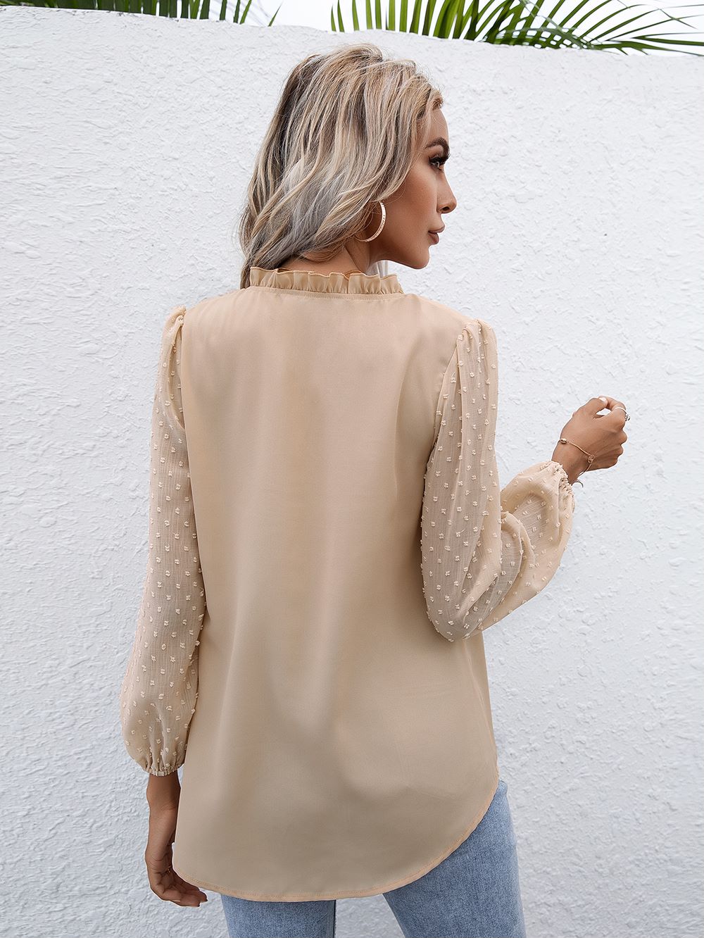 Blusa de manga larga con lunares y campana Clip