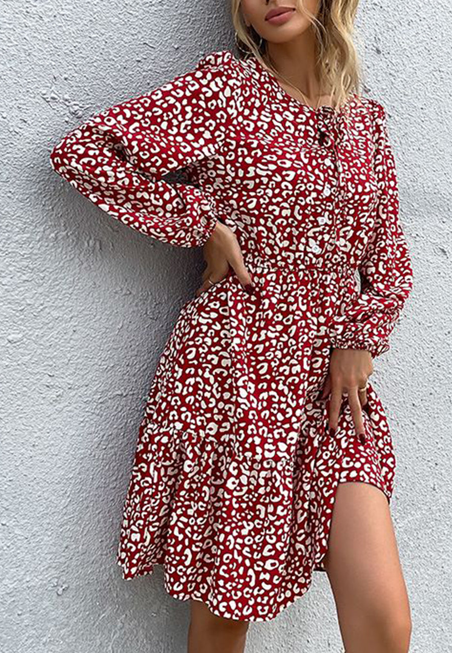 Vestido de manga larga con lazo en el cuello y abertura en forma de cerradura