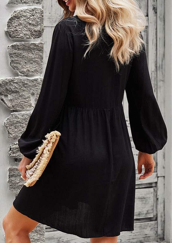 Vestido túnica con cuello anudado 