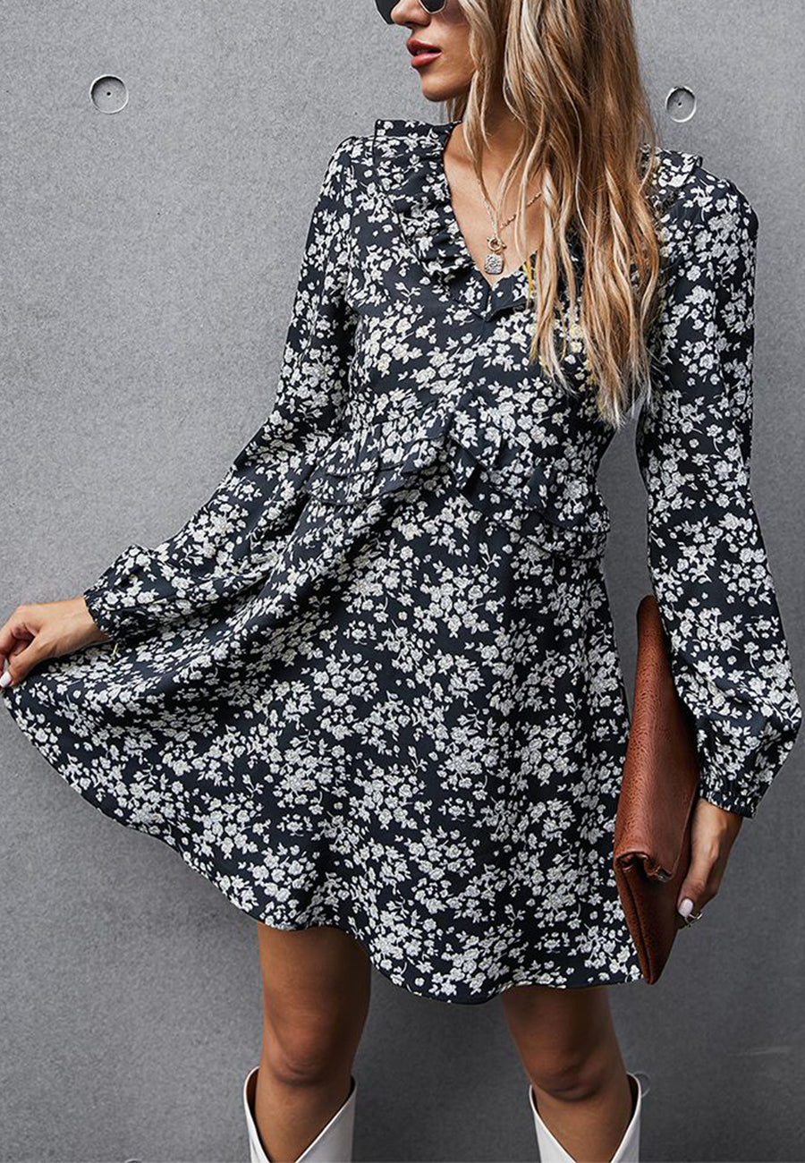 Vestido con volantes y estampado floral 