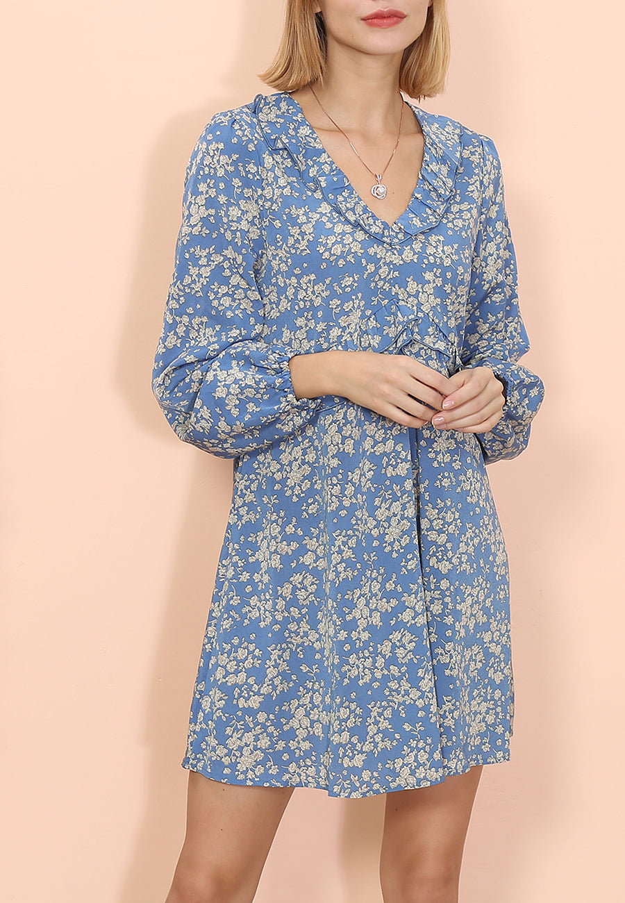 Vestido con volantes y estampado floral 