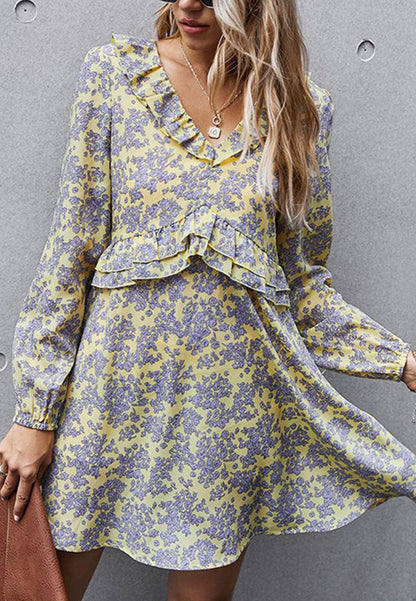 Vestido con volantes y estampado floral 