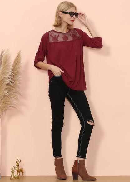 Blusa con detalle de encaje y codo a media altura 
