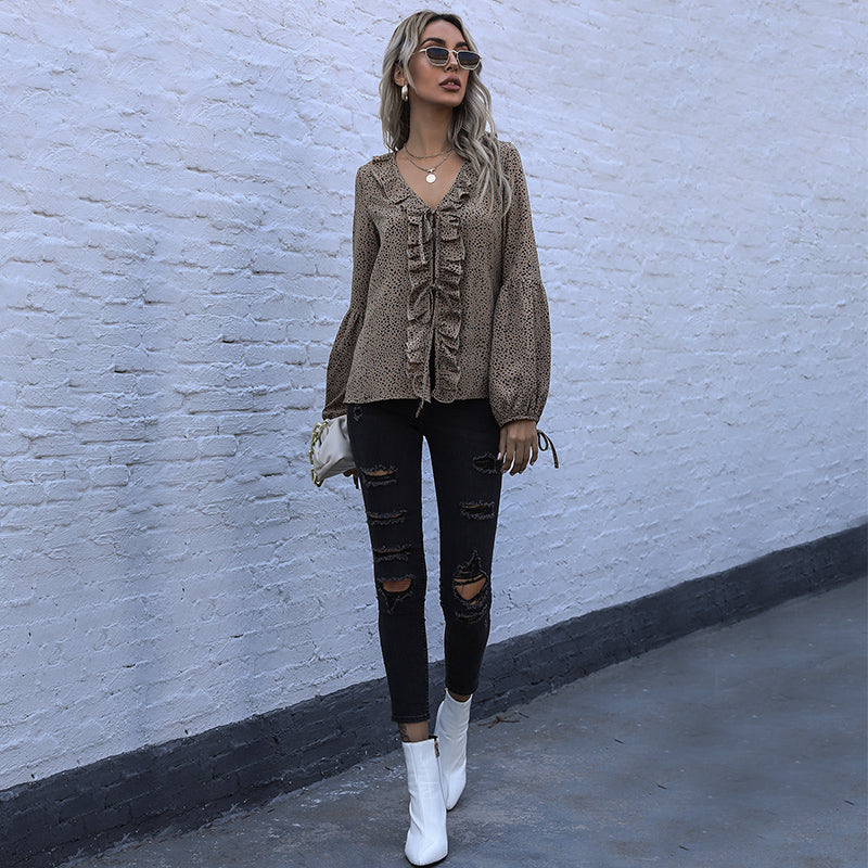 Blusa con estampado de guepardo y volantes en la parte delantera 