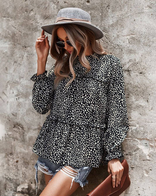 Blusa con estampado de guepardo y cuello con volantes 