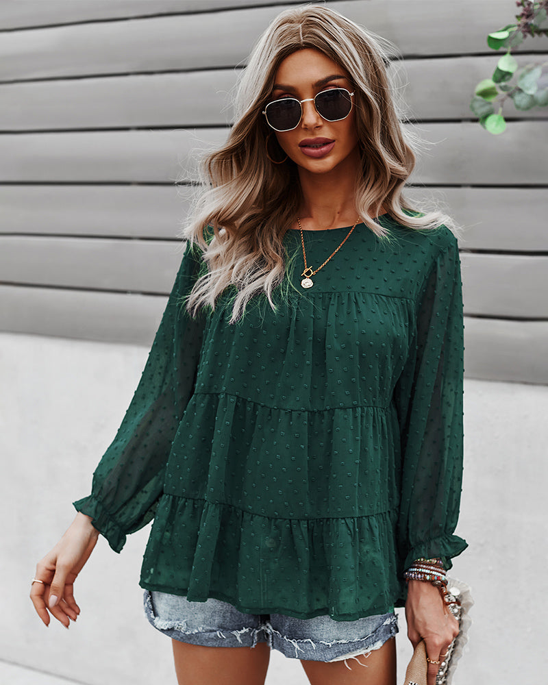 Blusa con capas y lunares con pinzas 