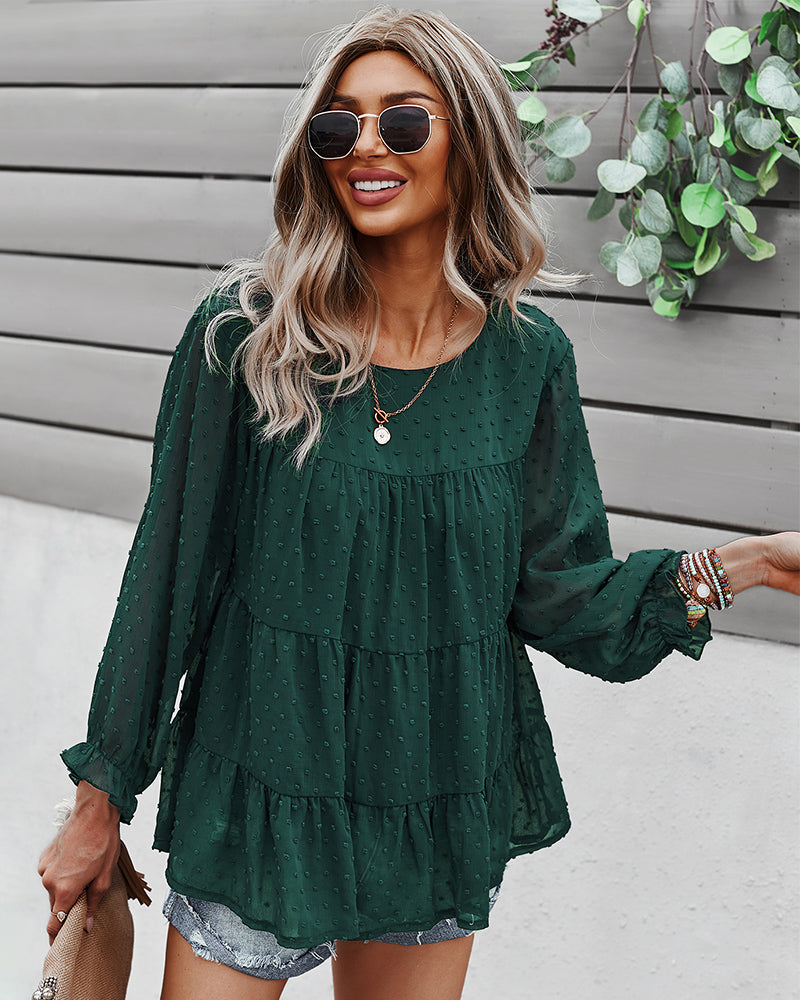 Blusa con capas y lunares con pinzas 
