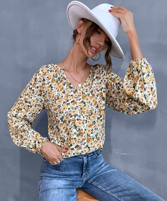 Blusa vintage con cuello en V y estampado floral