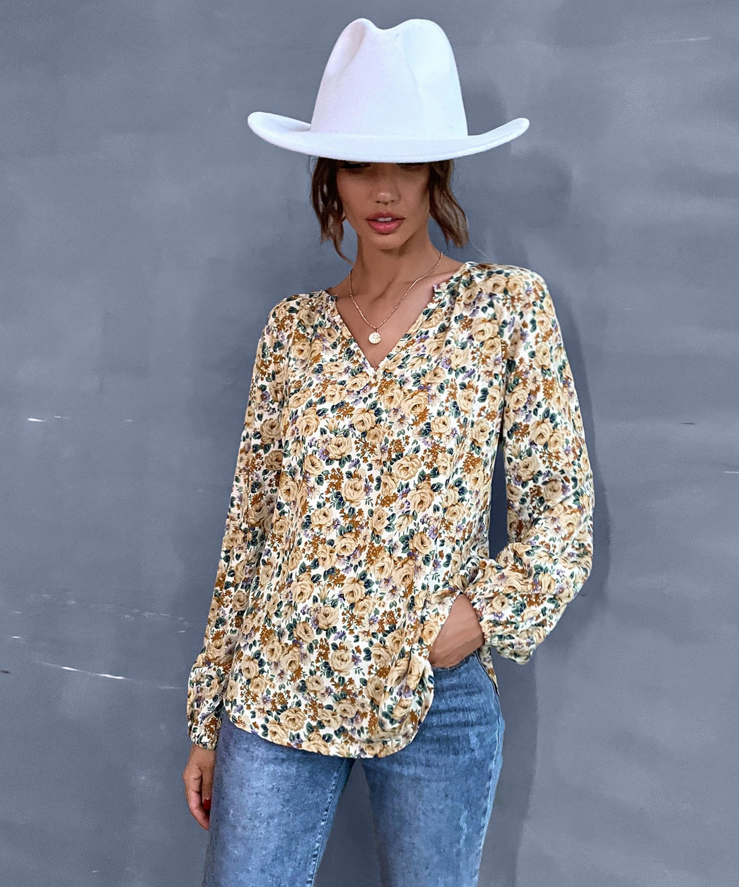Blusa vintage con cuello en V y estampado floral