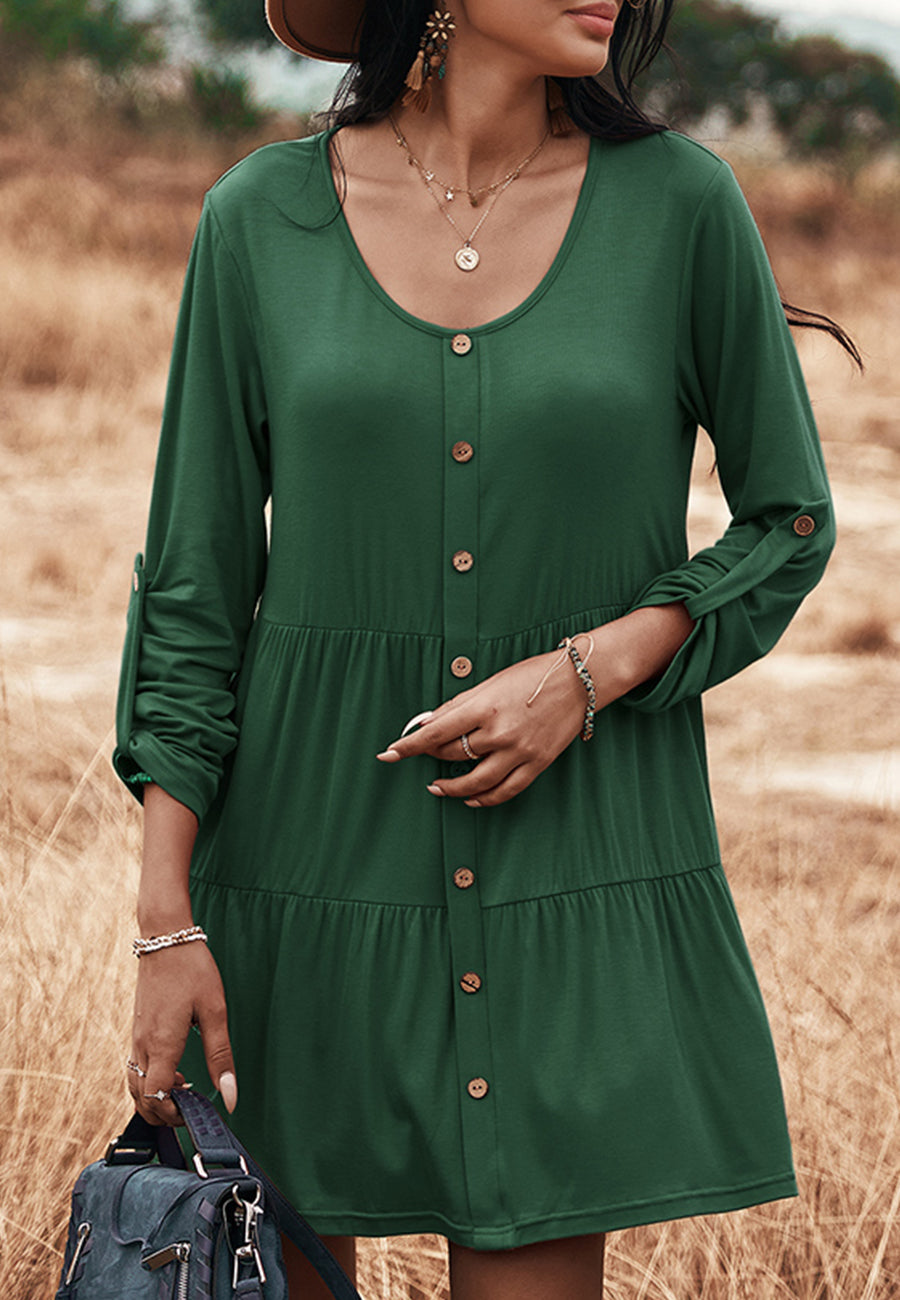Vestido recto con botones y capas 