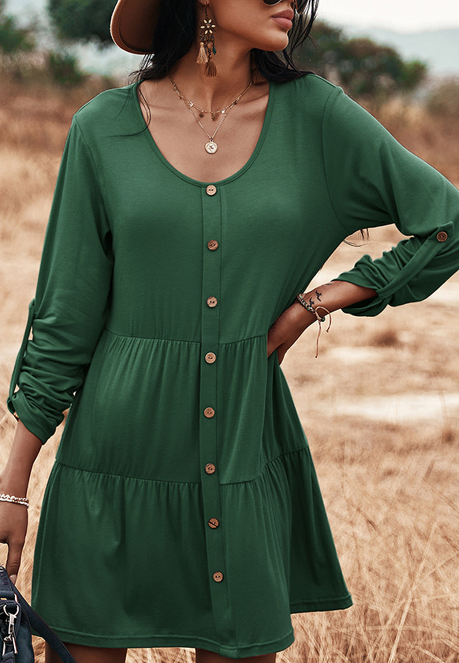 Vestido recto con botones y capas 