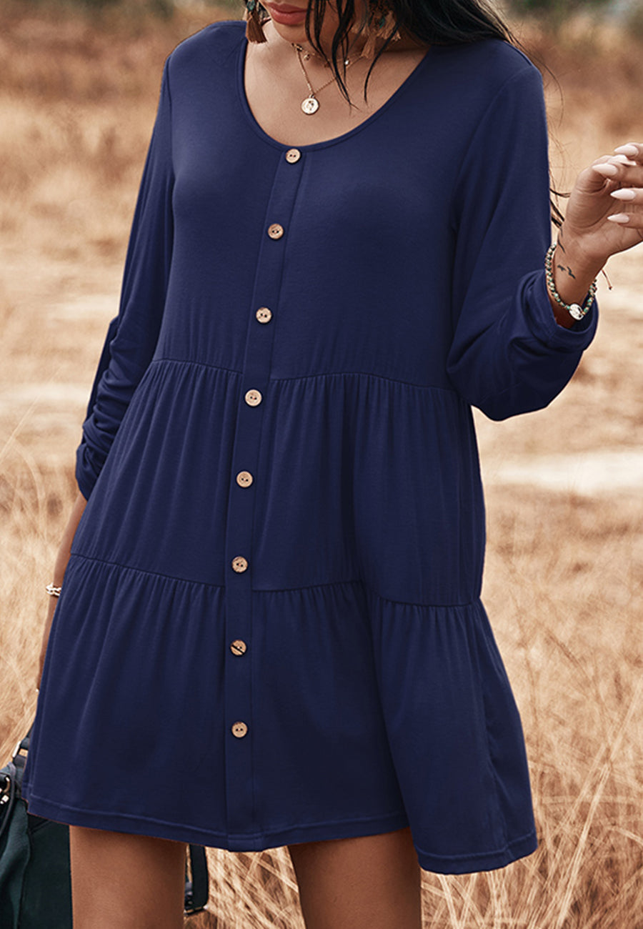 Vestido recto con botones y capas 