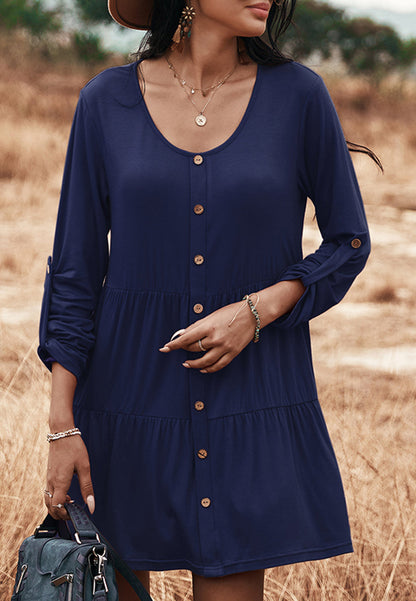 Vestido recto con botones y capas 