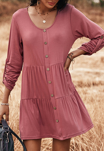 Vestido recto con botones y capas 