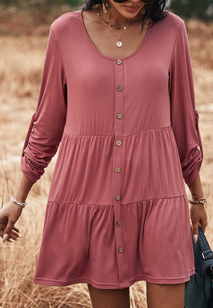 Vestido recto con botones y capas 
