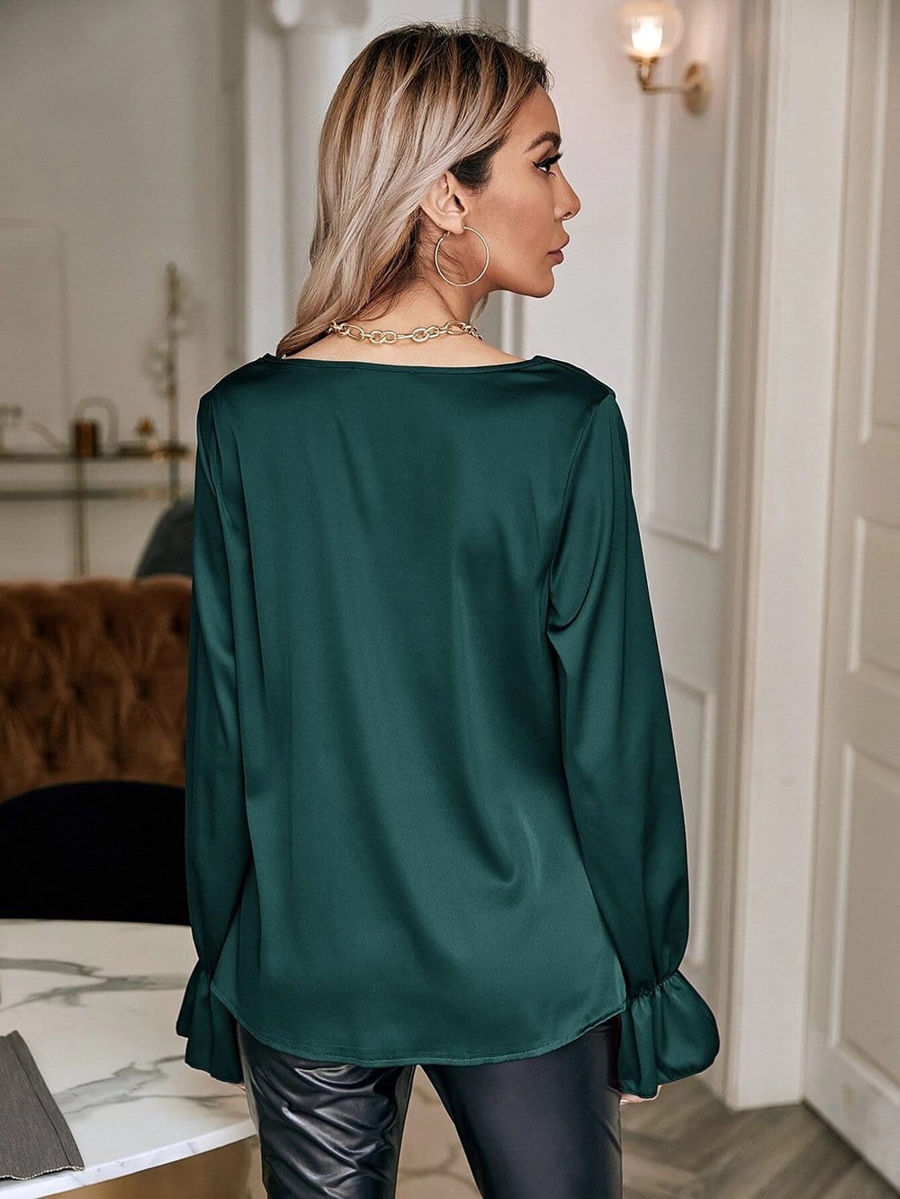 Blusa de manga larga con cuello vuelto 