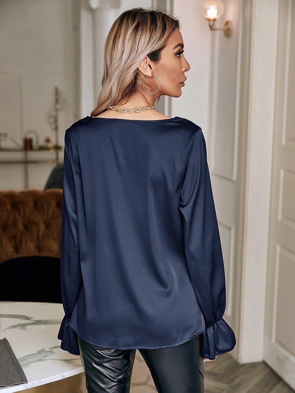Blusa de manga larga con cuello vuelto 