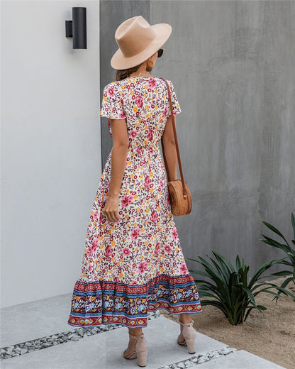 Vestido bohemio con flores y detalle de botones 
