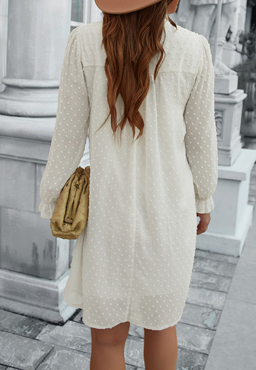 Vestido de lunares suizos con cuello con volantes