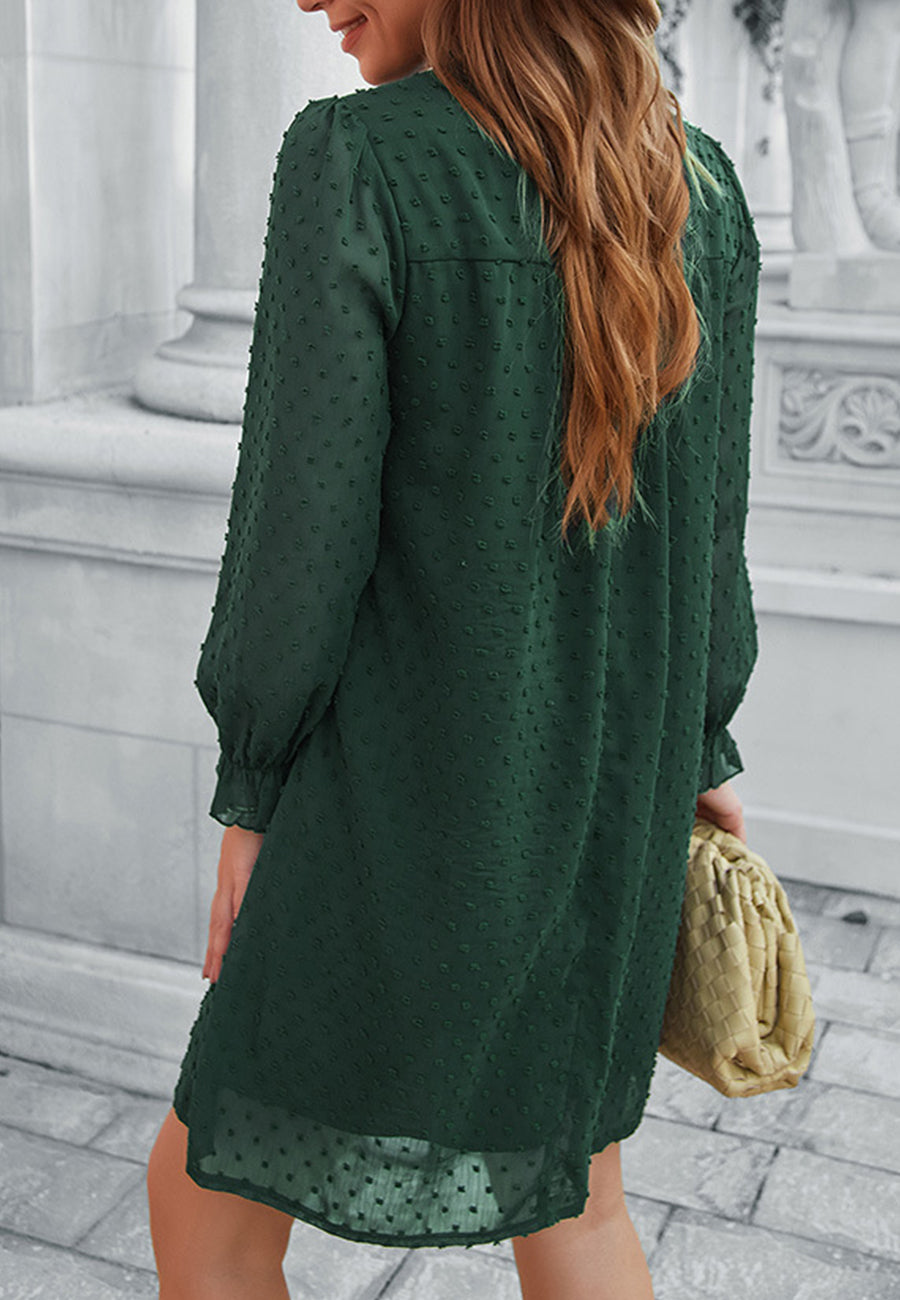 Vestido de lunares suizos con cuello con volantes