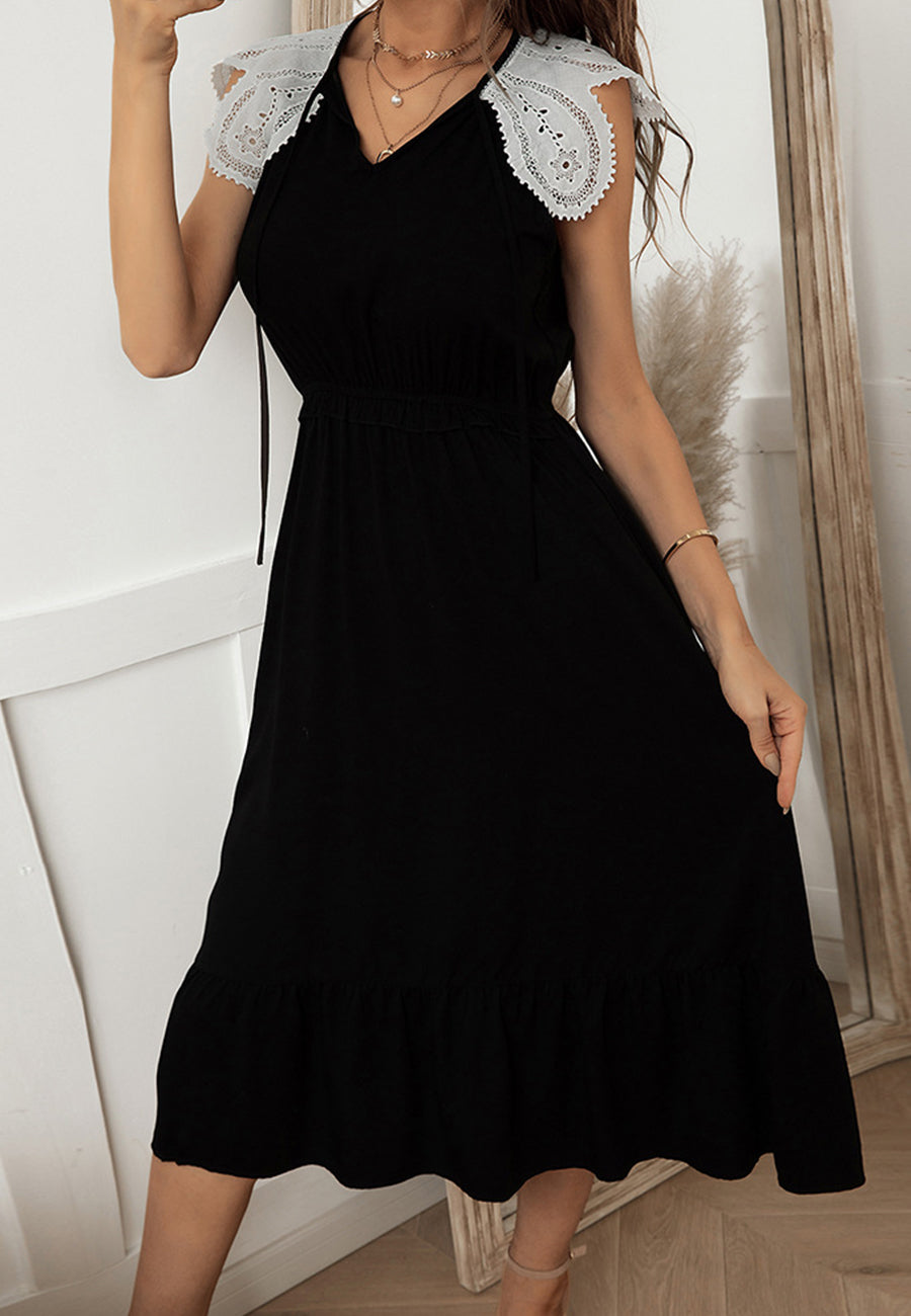 Vestido con mangas de encaje y cuello anudado