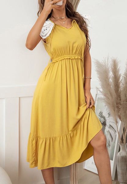Vestido con mangas de encaje y cuello anudado