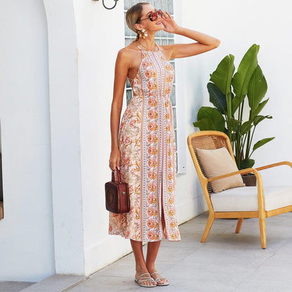 Vestido floral sin espalda y con cuello halter