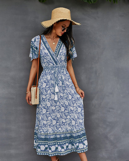 Vestido bohemio con estampado floral y escote cruzado