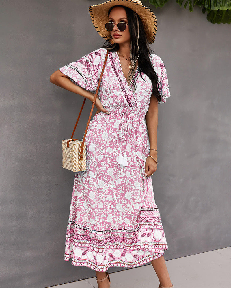 Vestido bohemio con estampado floral y escote cruzado
