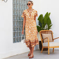 Vestido bohemio con estampado floral y escote cruzado