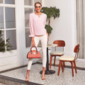 Blusa con abertura en la parte delantera y lunares suizos