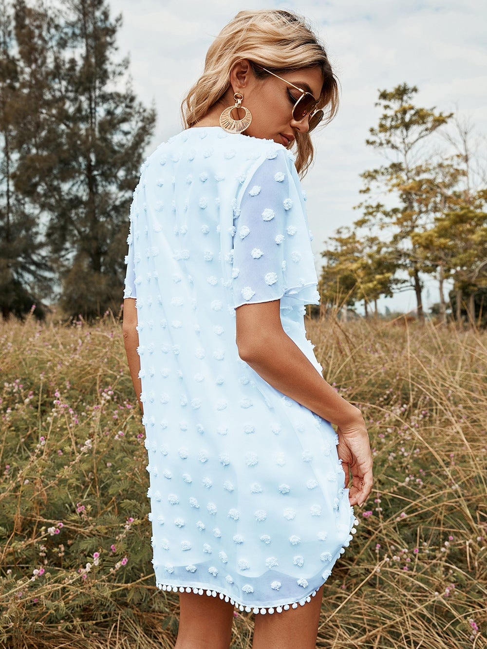 Vestido con adornos de pompones y lunares 