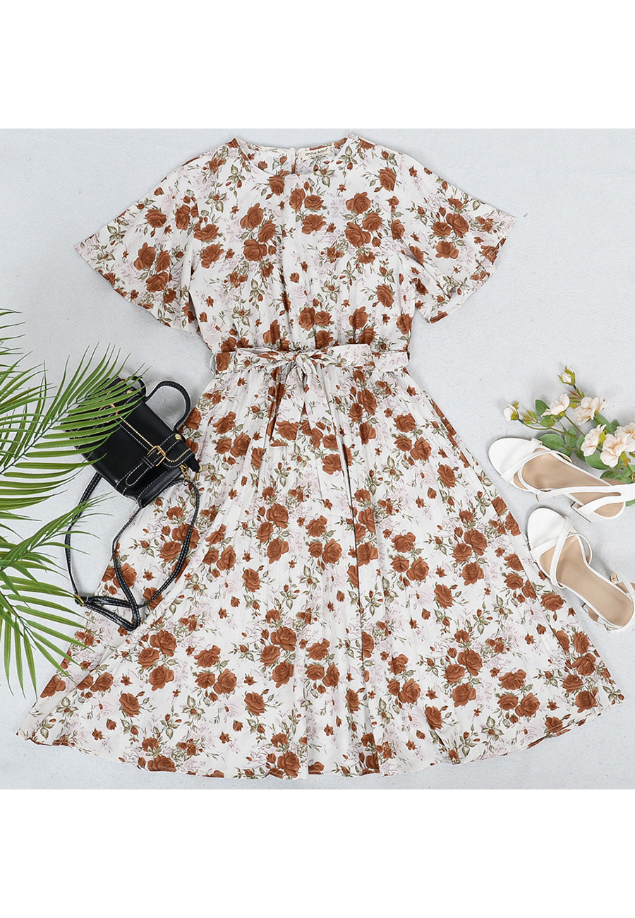 Vestido plisado con flores y cuello redondo