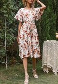 Vestido plisado con flores y cuello redondo