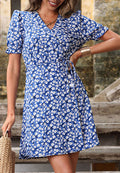 Vestido cruzado con detalle de botones florales