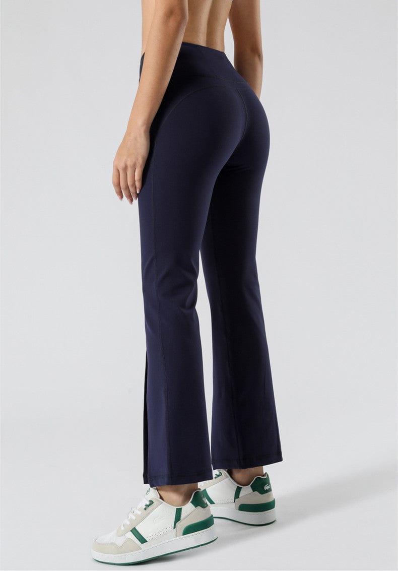 Pantalones acampanados de cintura media con aberturas en el centro delantero