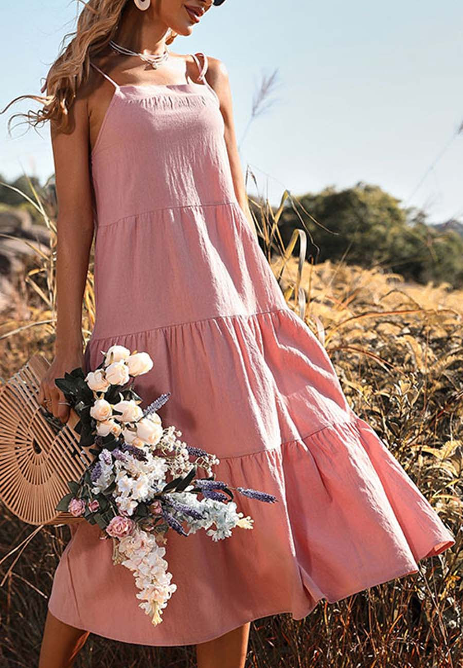 Vestido con hombros descubiertos y lazos