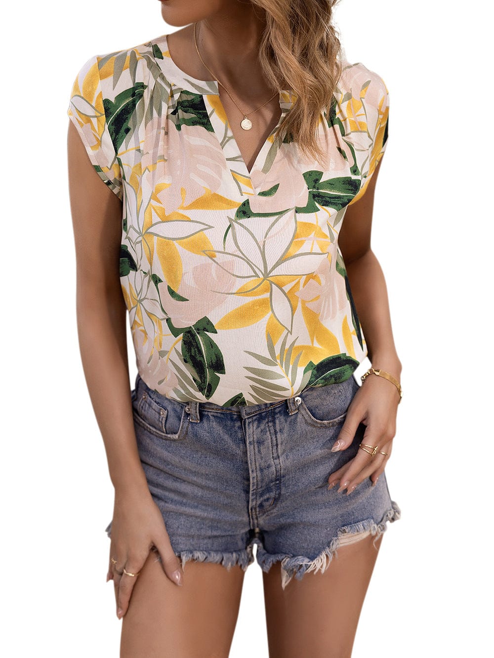 Blusa con mangas cortas y estampado floral