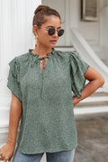 Blusa con volantes y mangas escalonadas